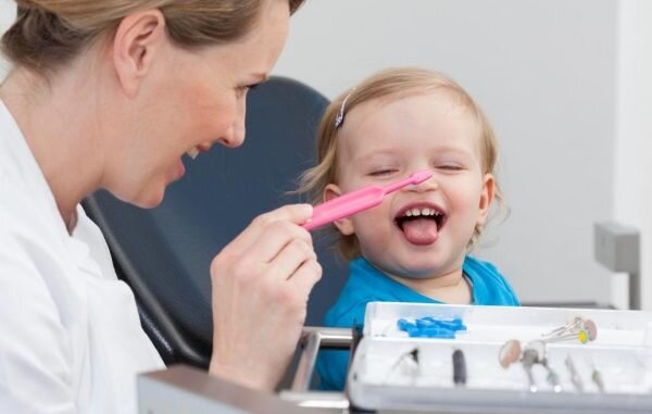 Как настроить ребенка на лечение зубов?