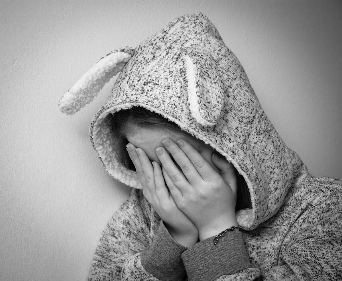 https://www.pexels.com/photo/close-up-of-girl-covering-face-326580/