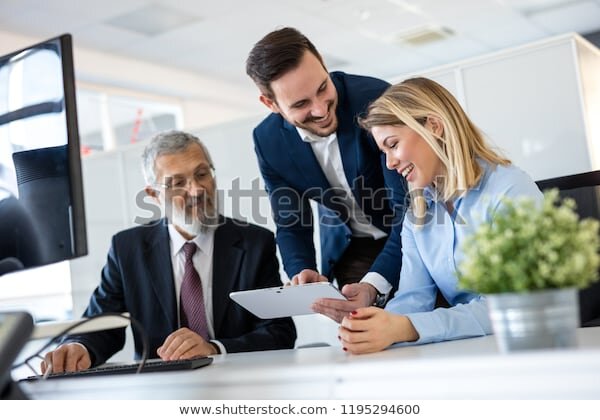 https://image.shutterstock.com/image-photo/smiling-young-manager-helping-senior-600w-1195294600.jpg