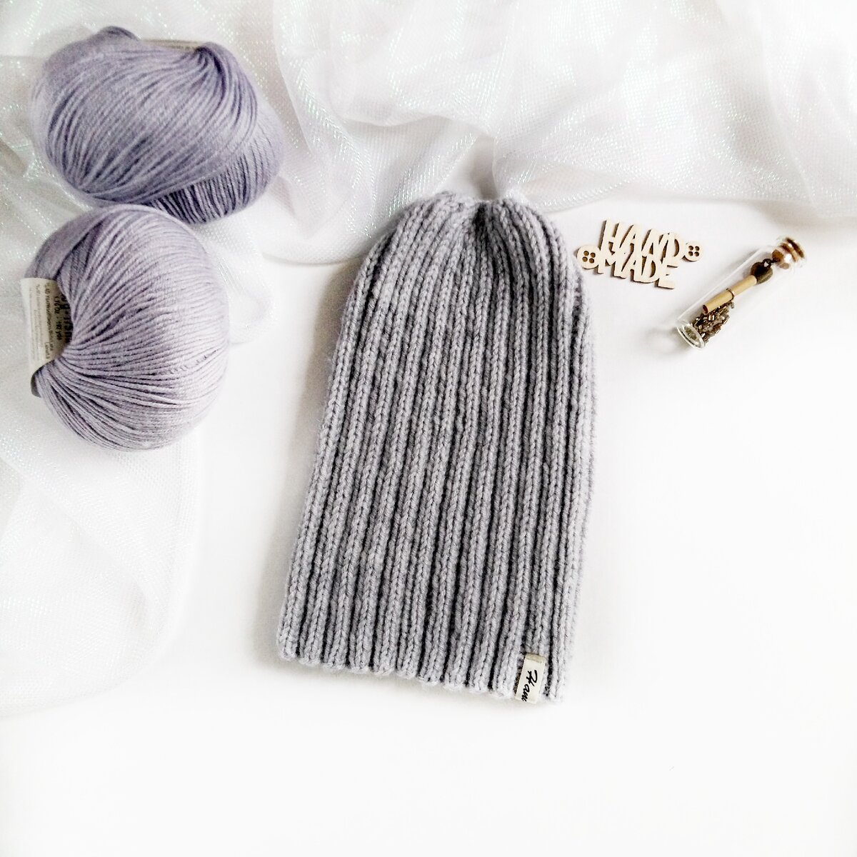 Вязаная шапка тыковка спицами 