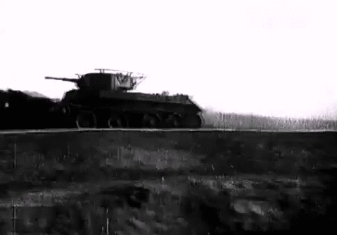 Знаменитый "танковый прыжок" танка БТ-7 . За рычагами - испытатель, капитан Евгений Анатольевич Кульчицкий. Взято из интернет-ресурса.