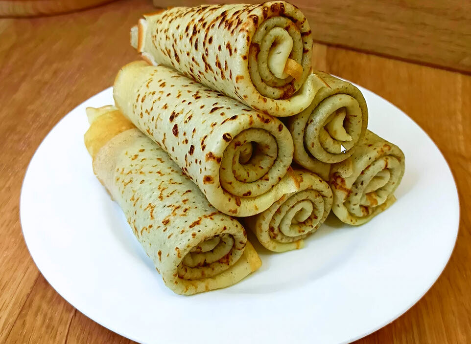 Красивые и очень аппетитные блинчики.