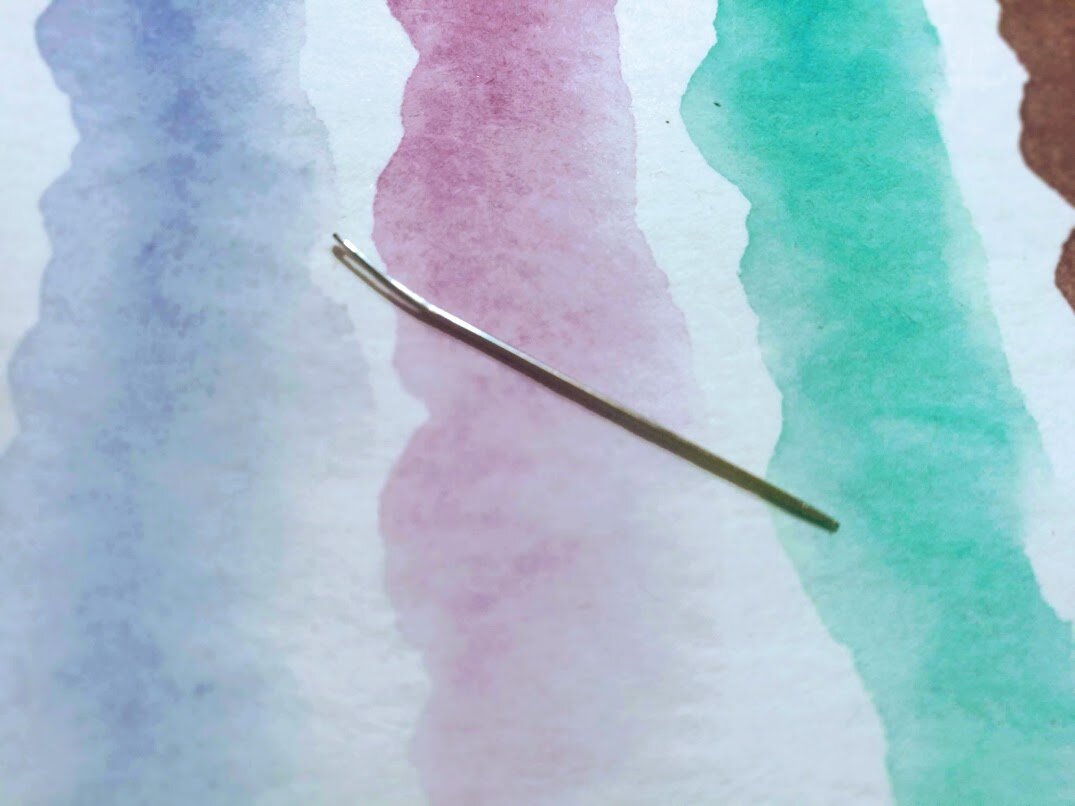 погнувшаяся игла