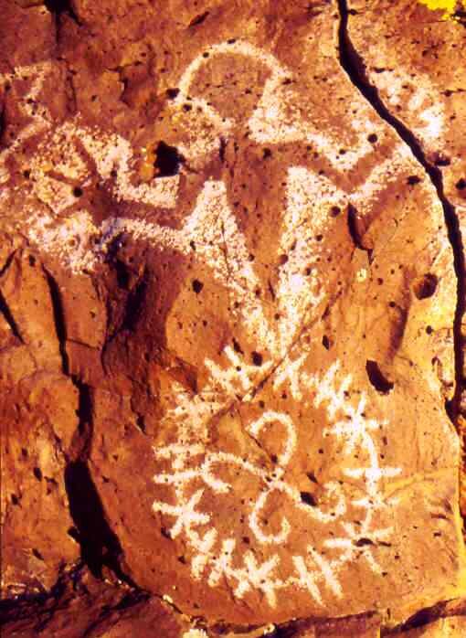 Быстровращяюшаяся звезда  и дракон. Наскальный рисунок. Штат Юта.