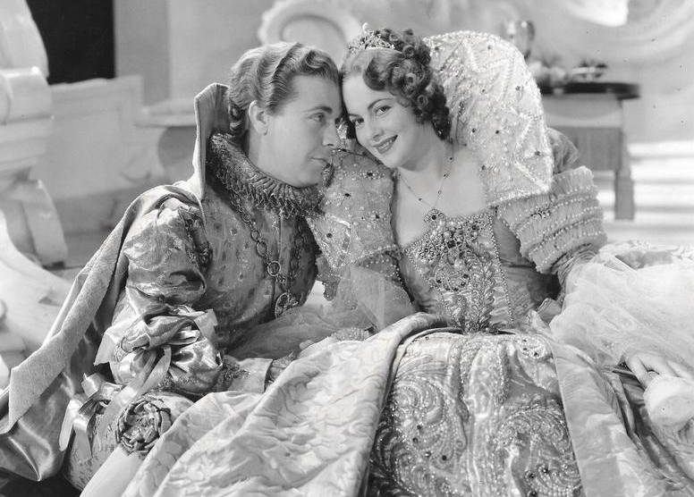 Оливия де Хэвилленд и Дик Пауэлл в фильме «Сон в летнюю ночь». Кадр из фильма