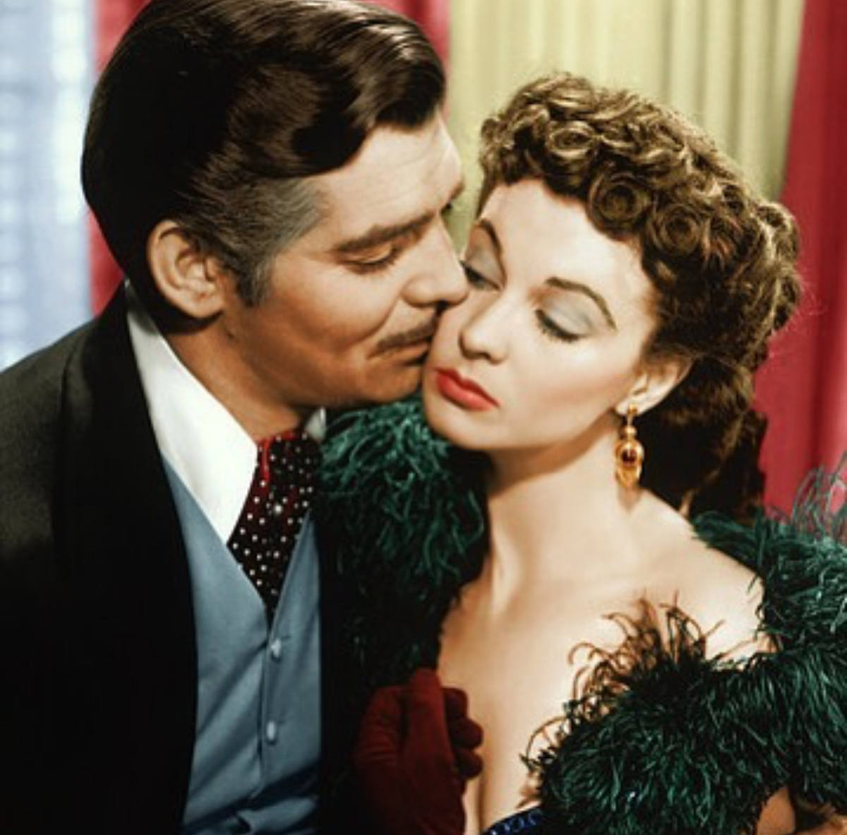 Скарлетт О’Хара и Ретт Баттлер.                     Кинофильм «Унесённые ветром» 1939 г.