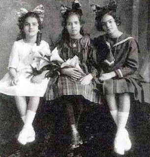 Frida at 12 and Christina, Frida's sister,  and Isabel Campos