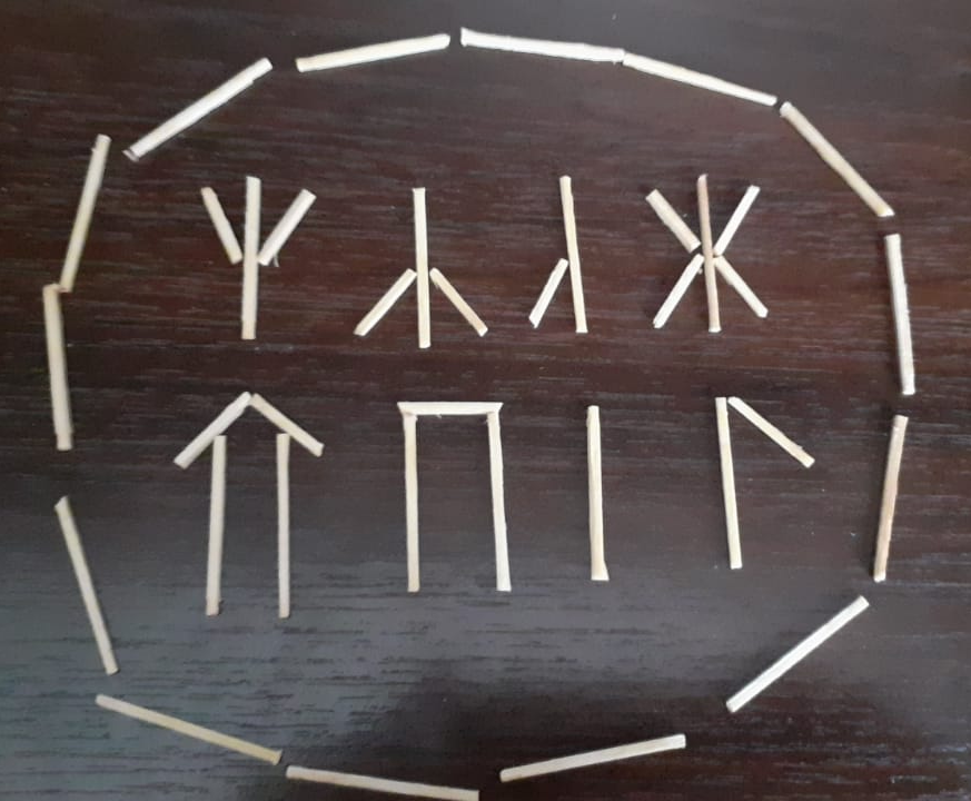 Сделала руны из палочек