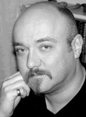 Это Абнетт. Только мне он тут кажется похожим на Сайфера из "Матрицы"?