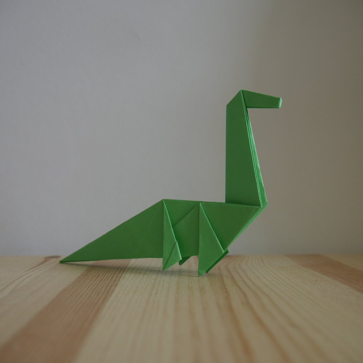 Как сделать динозавра из бумаги своми руками