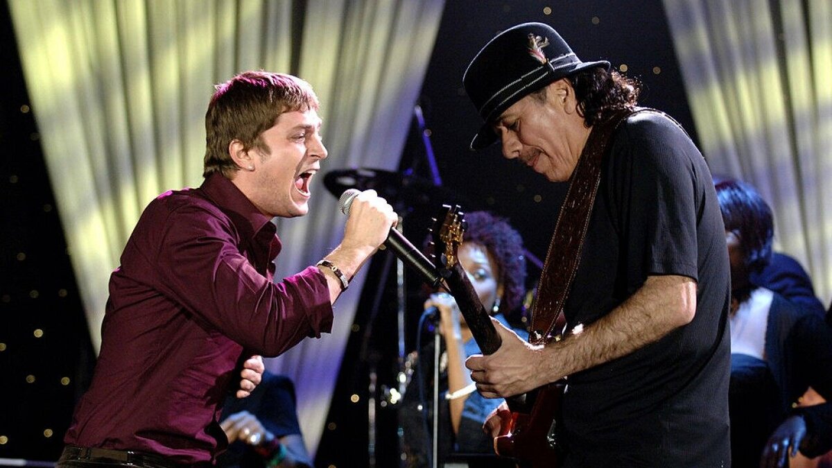 Rob Thomas и Carlos Santana исполняют Smooth, фото 2006-го года