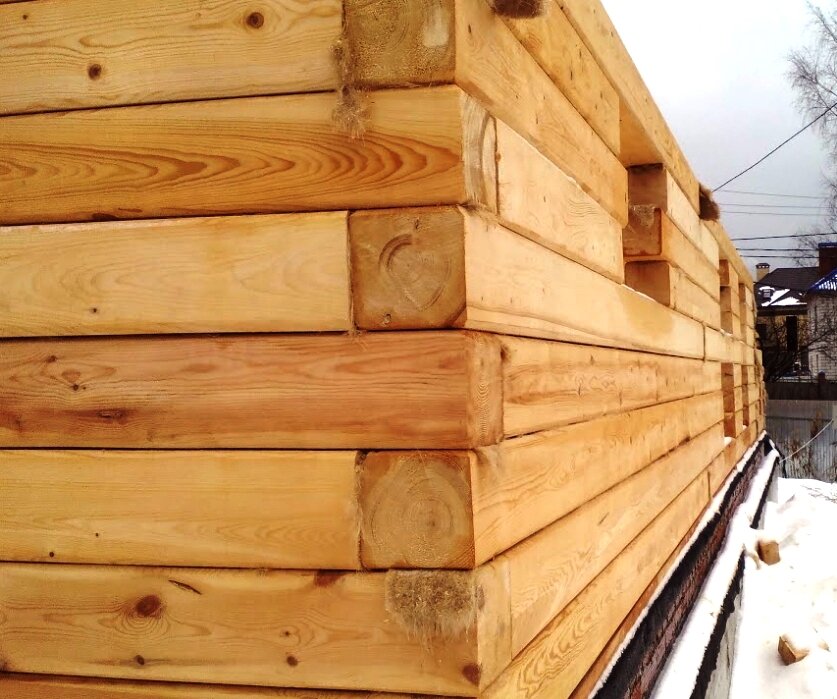 дом из бруса с фаской. дом под усадку. кладка бруса. баня из бруса естественной влажности. дом из профилированного бруса 10 на 18 фото.