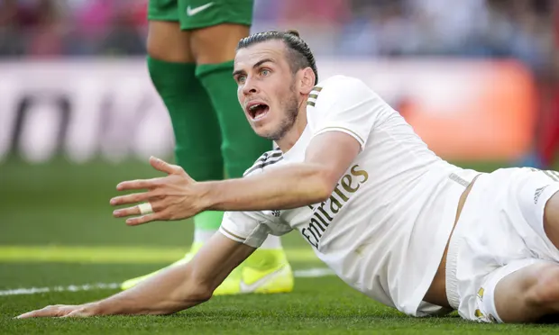  Гарет Бэйл сказал в начале сезона: «Я играю, но я бы не сказал, что я играю счастливо» в «Реале». Фотография: Soccrates Images / Getty Images