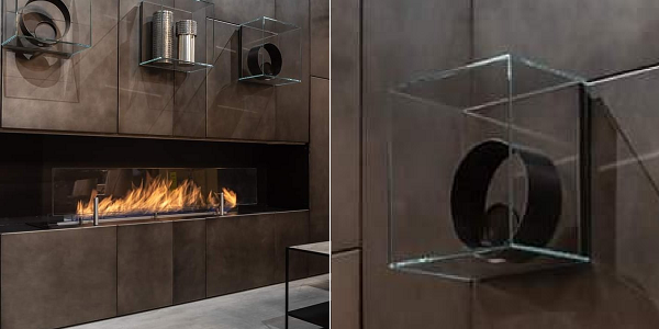 Стекло для топки в стиле минимализм дополнят парящие стеклянные кронштейны. Держатся они не на шурупах, а на высокопрочной монтажной ленте.