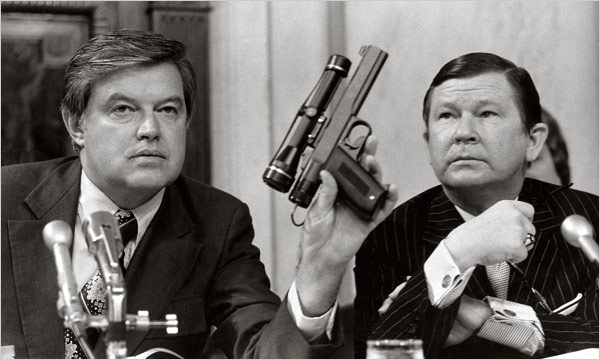 Senator Frank Church displays the CIA’s top-secret weapon known as the “heart-attack gun.”