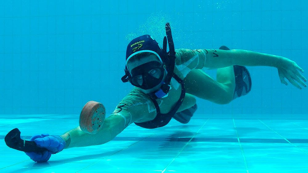 Подводный хоккей или октопуш. Подводный хоккей (Underwater Hockey). Подводный хоккей в Великобритании. Хоккей купание