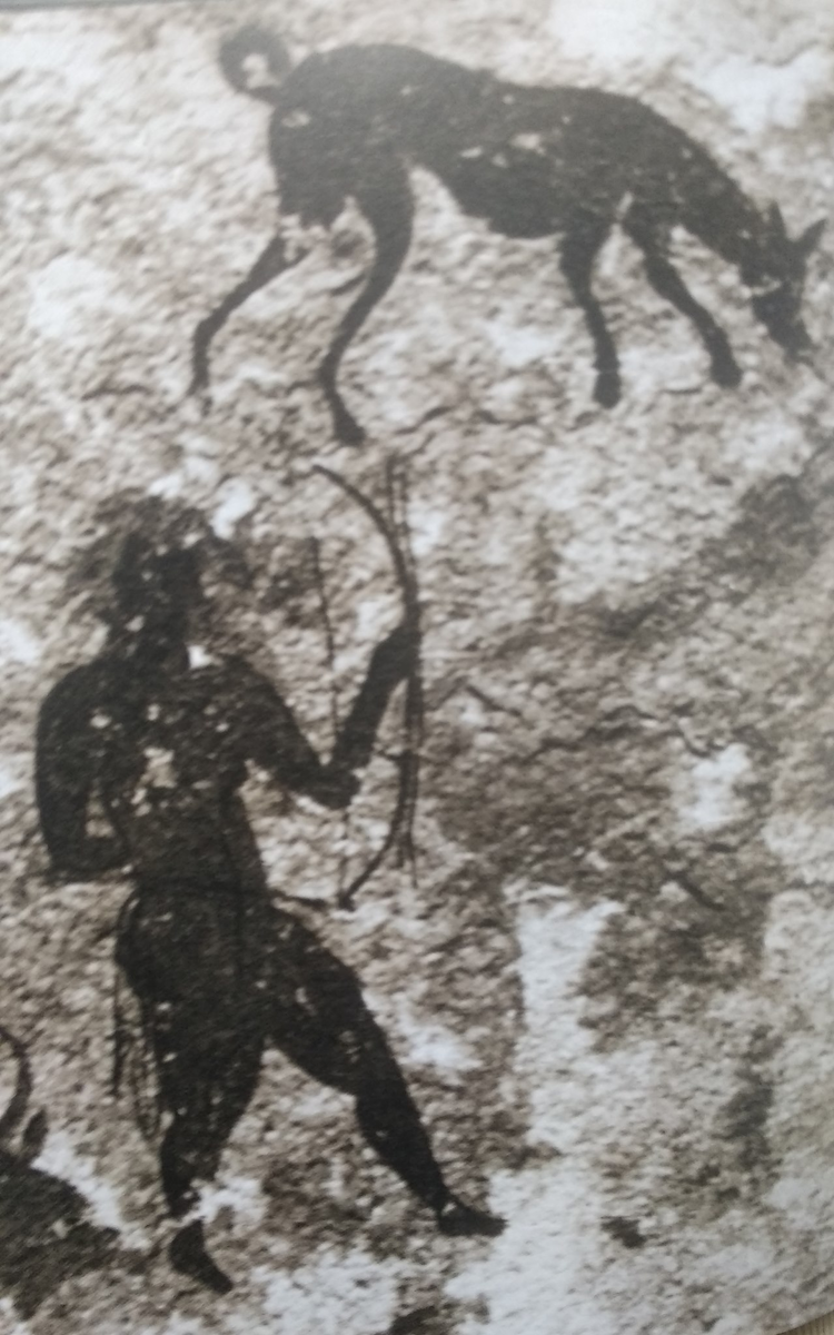 Охотник с собакой. Наскальное изображение. Африка. Пустыня Сахара, скальный массив Сефар. IV тысячелетие до н.э.  