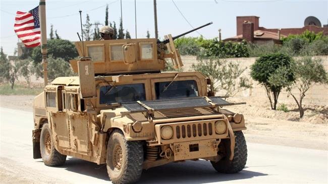Военная техника США на юге Сирии, 12 мая 2018 (Фото: Reuters)