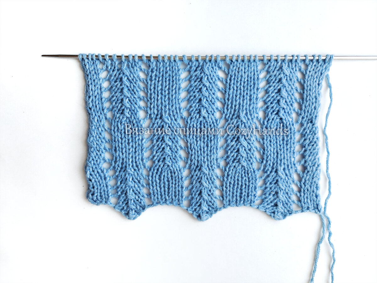 Вертикальные ажурные линии спицами