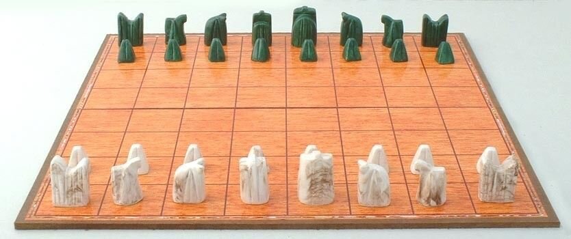 Какая древняя игра является предшественницей шахмат. Шатрандж шахматы. Персидский шатрандж шахматы. Шатрандж (древние индийские шахматы). Шатрандж (древние индийские шахматы) фигуры шахмат.