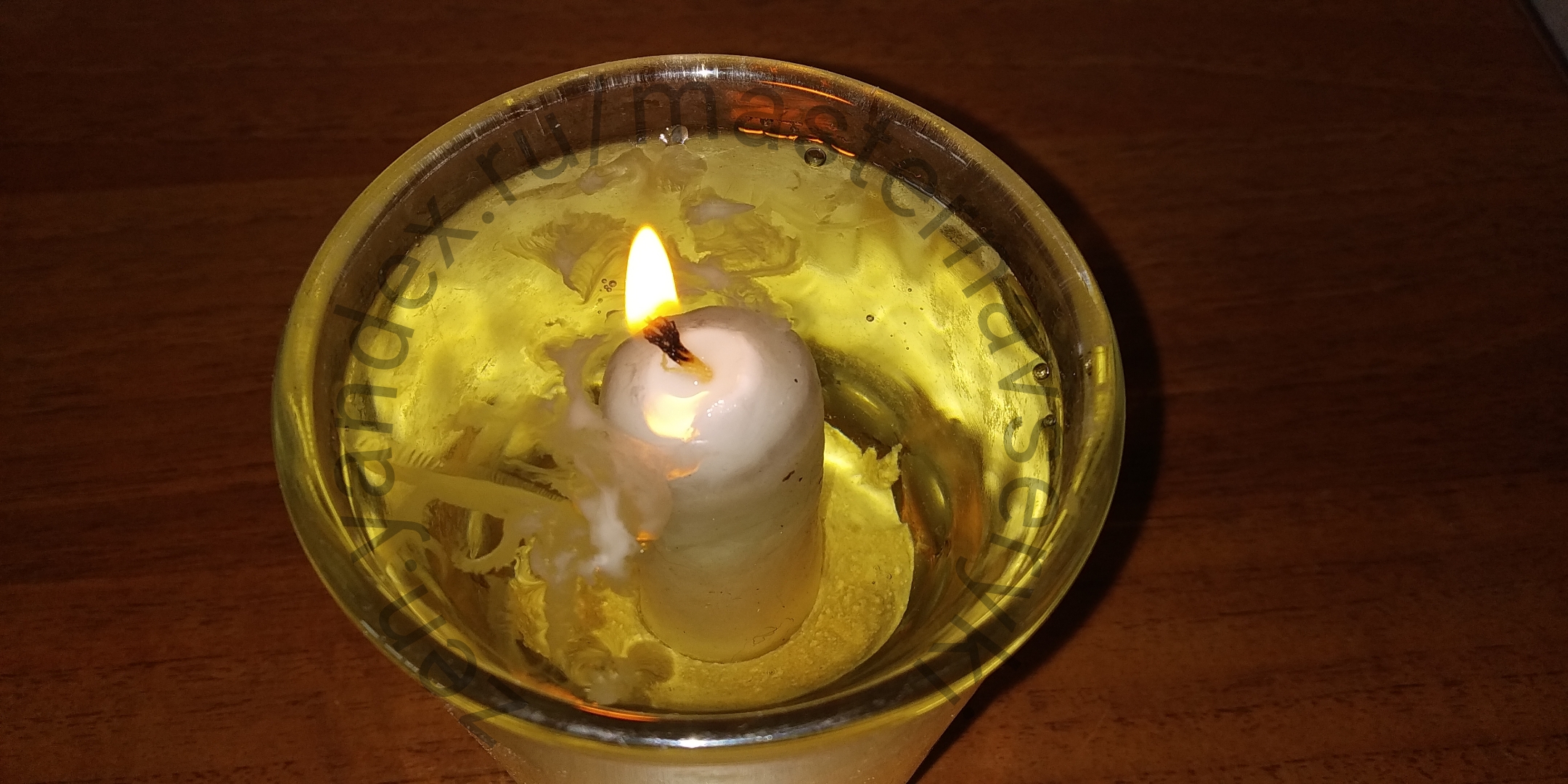 Масло под свечой