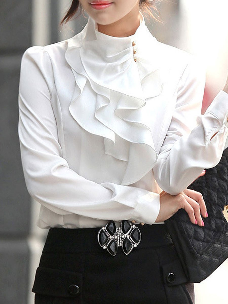 Блузка с высокой горловиной