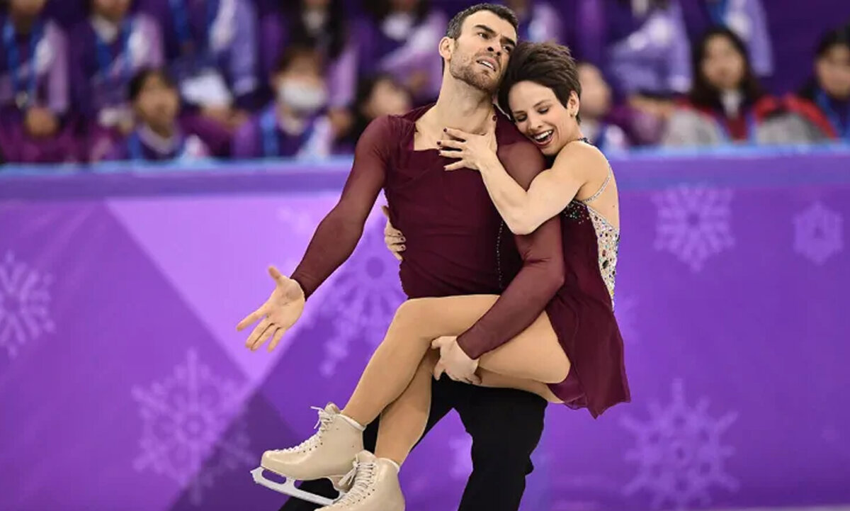 Эрик Рэдфорд и Меган Дюмель. Источник: Aris Messinis/AFP/Getty Images