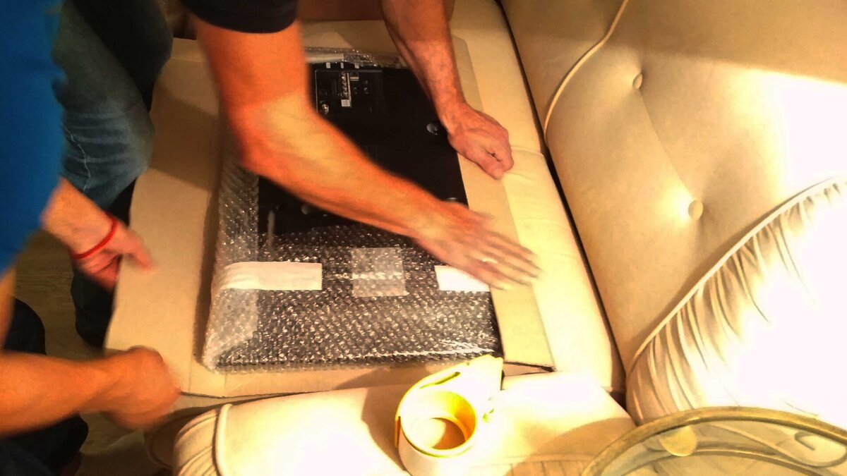 Упаковка телевизора для перевозки в другой город