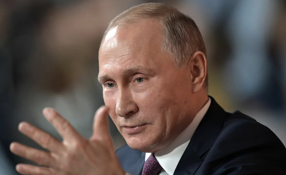 Путин