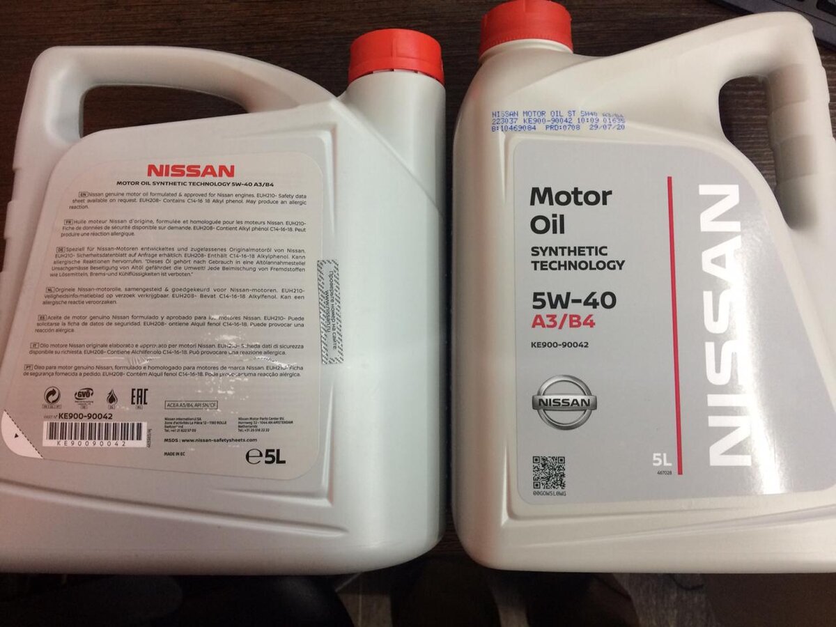 на канистре старого образца наклейка стикер с проверочным кодом (слева)