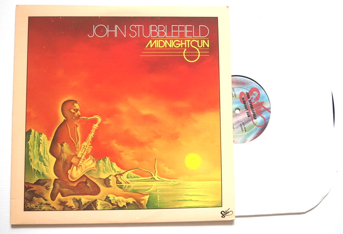 Альбом 'Midnight Sun' Джона Стабблфилда, выпущенный лейблом Sutra в 1980 году. Оригинальное американское издаине