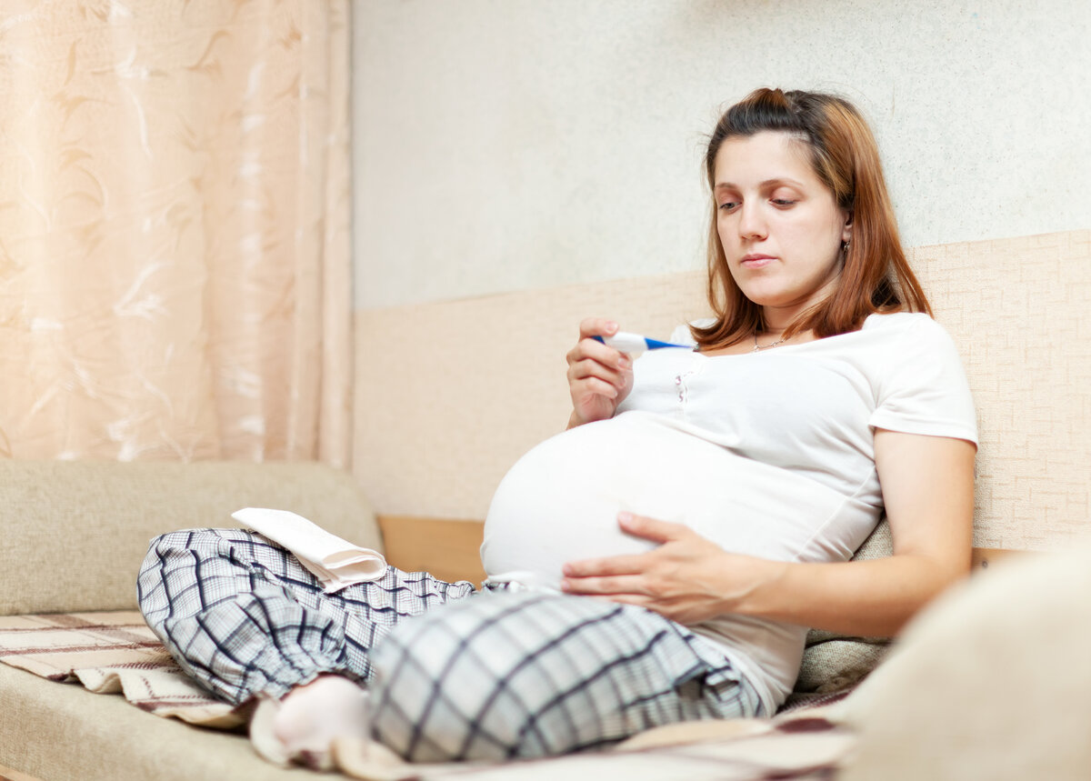 Беременность. Беременные и грипп. Тело беременной женщины.
