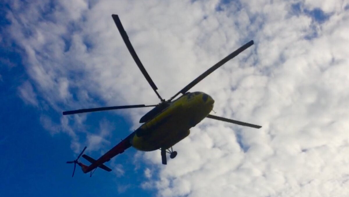 Под вертолетом