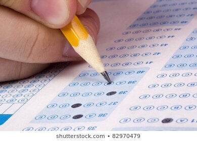 https://image.shutterstock.com/image-photo/student-filling-out-answers-test-260nw-82970479.jpg