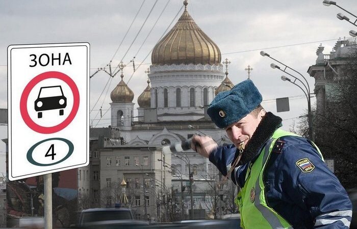 Дорожный знак с цифрой в зеленом круге.