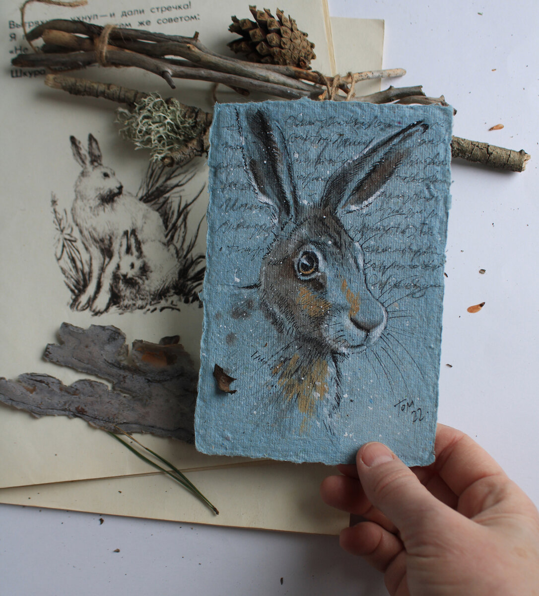 зай на ручной бумаге.