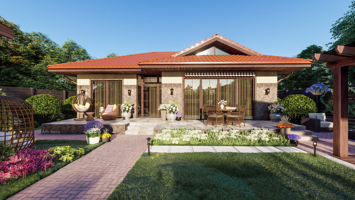 Так выглядит главный фасад. Кровля с большими свесами, витражные окна.