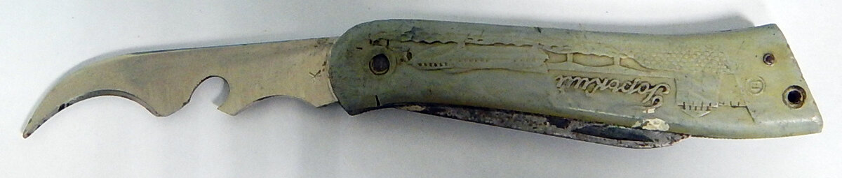 По длине консервооткрыватель не уступает клинку.