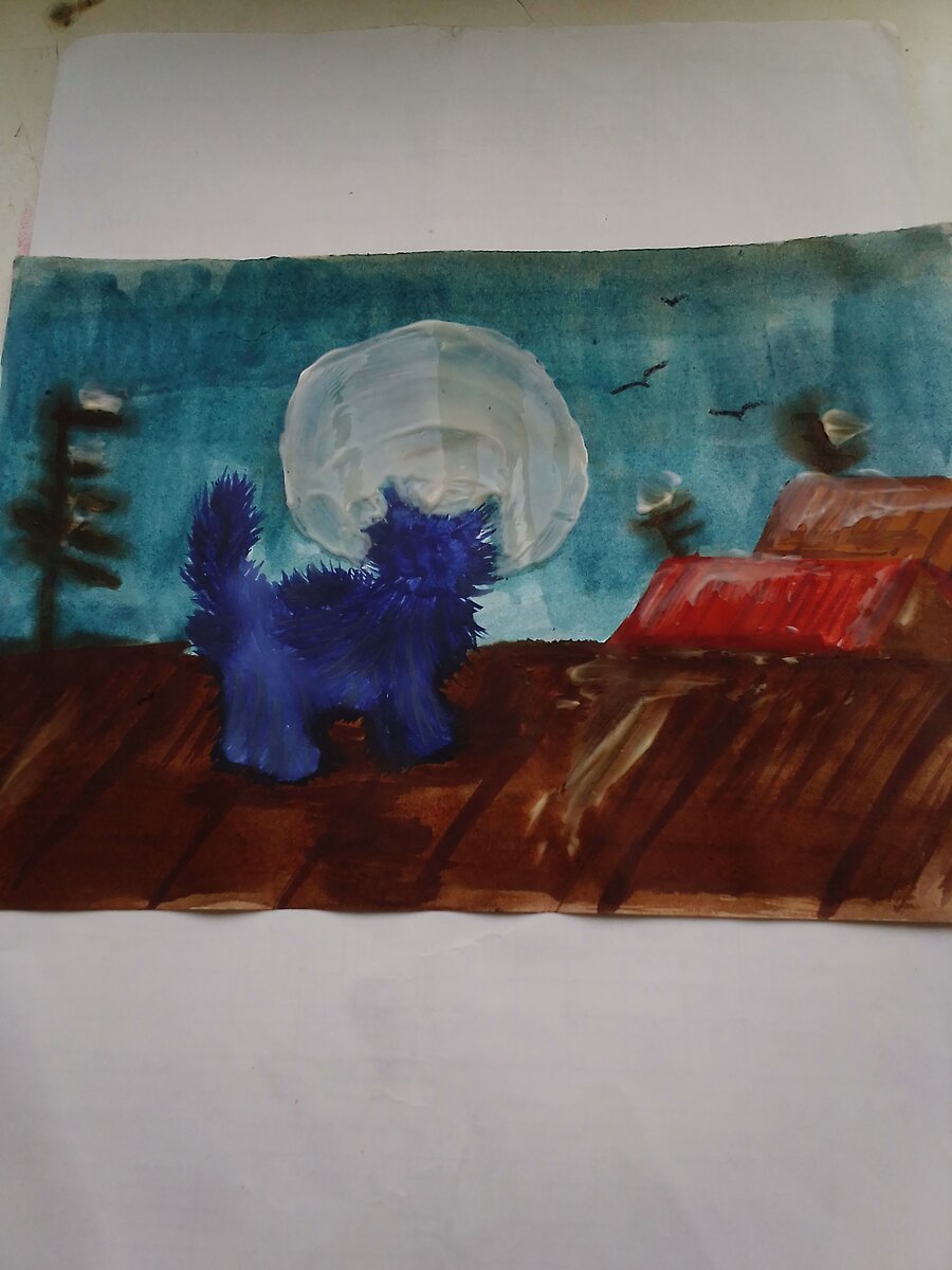 Синий котенок на крыше.