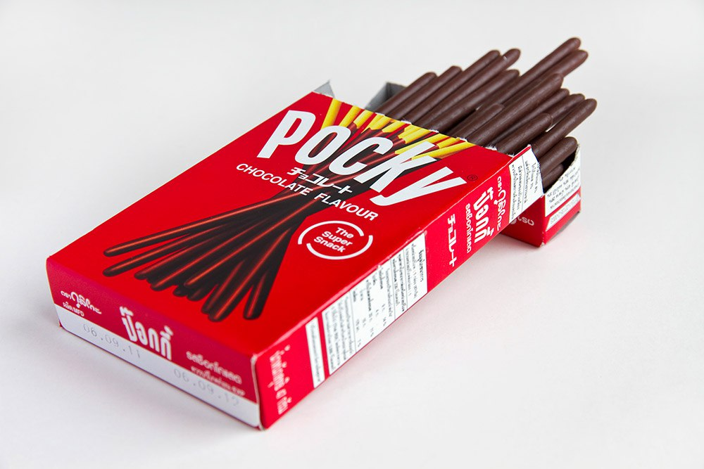 Японские палочки Pocky. Японские сладости палочки Pocky. Шоколадные палочки Pocky. Палочки в шоколаде Pocky.