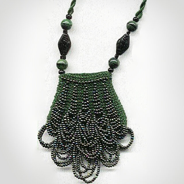    Ридикюль с бисером   
Источник: Фотография из блога «KNUTTINESS»