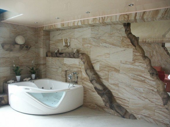 «Гибкий камень» — это натуральный природный материал. В его основе – песчаник, древнейший отделочный материал, который использовался в строительстве с незапамятных времен.Гибкий камень по своим свойствам можно с уверенностью назвать уникальным материалом. Эластичный, толщиной всего в 1,5−03 мм, состоящий из цветной натуральной мраморной крошки и экологически чистого полимера, гибкий камень имитирует песчаник, клинкерный кирпич, сланец и другие подобные материалы. 