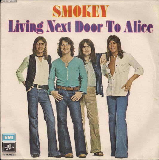 Песня living next door. Группа Smokie. Smokie постеры. Группа Smokie обложки альбомов. Постер группы Smokie.