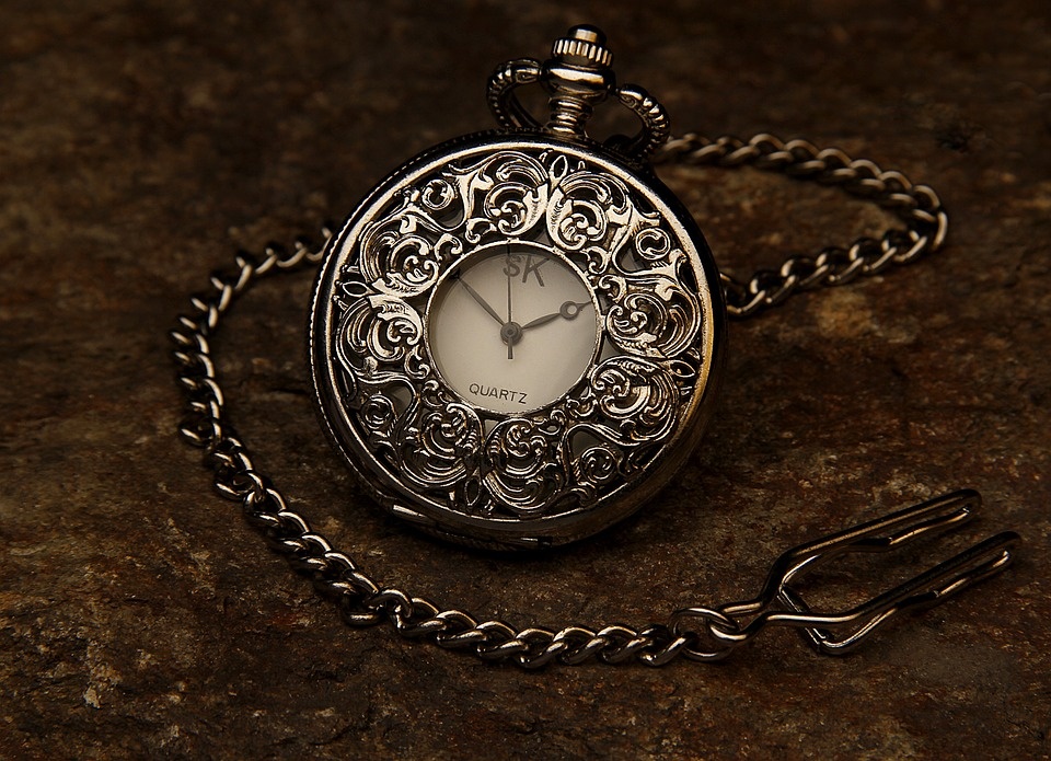 https://pixabay.com/photos/pocket-watch-jewel-chain-stone-560937/