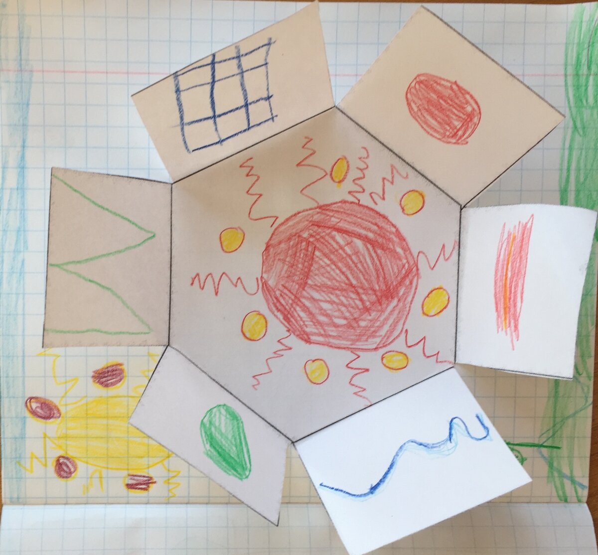 Ребенок вклеивает свою ромашку в тетрадь и по желанию, оформляет страничку.