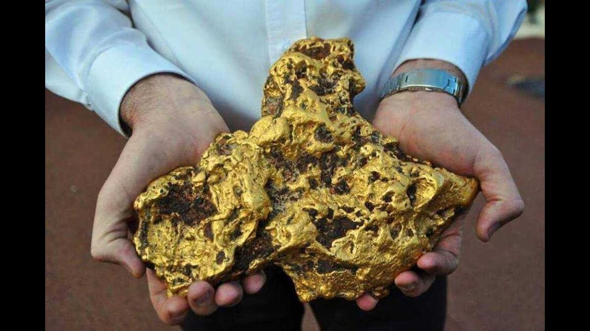 Изображение из общего доступа, но это на самом деле золотой самородок в моих руках.