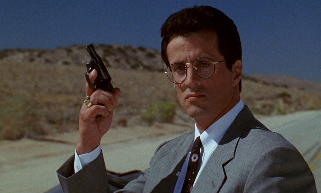 кадр из фильма Танго и Кэш 1989 Сильвестр Сталлоне