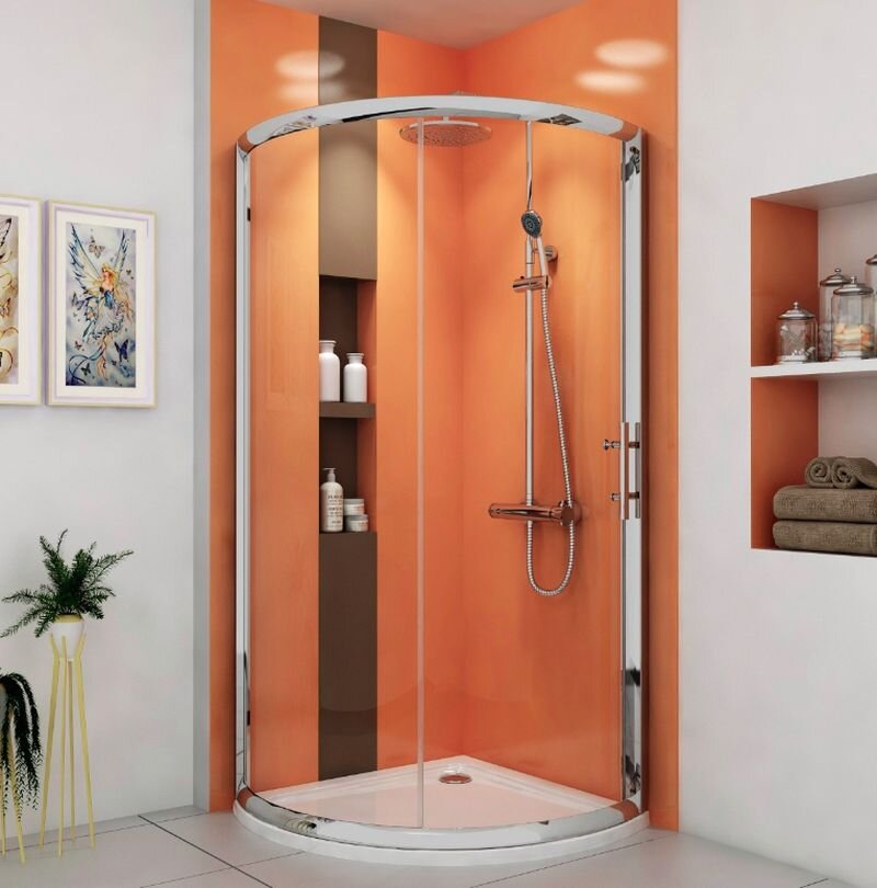 Современный душевой уголок округлой формы с поддном.