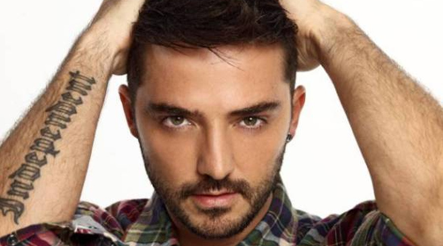 Турецкий певец Гекхан Озен