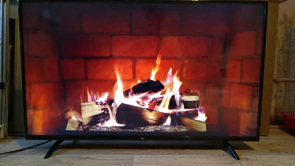 Камин на экране монитора: огонь, уют и комфорт в виртуальном формате